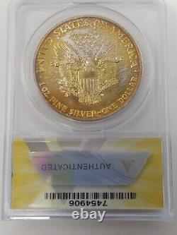1987 American $1 Silver Eagle 1 oz. Fine 999 ANACS MS67 Blue & Gold Toned