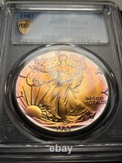 1987 American Silver Eagle PCGS MS68 Sweet Gold Rainbow Tone