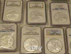 Coins dollars 50 American Eagles NGC graded lot MS69 1986 thru 2021 W + Heraldic